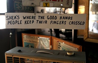 2015-10 Shea's (7) Hand-lettered signs featuring homespun humor and whimsical sayings hang throughout the main museum as well as Mahan's filling station seen here on Thursday,...