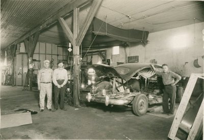 19xx garage opposite melba - Leonard Anderson, August Bradshaw & Russell Flannery inside the garage