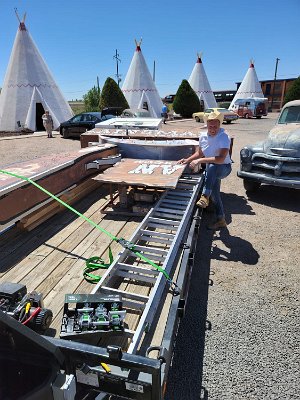 2022-05-30 Holbrook - The Plainsman sign being removed by Bill Gittins 2