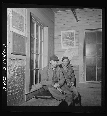 1943 Seligman, Arizona. Switchmen in their shanty ready to go to work in the Atchison, Topeka, and Santa Fe Railroad yard