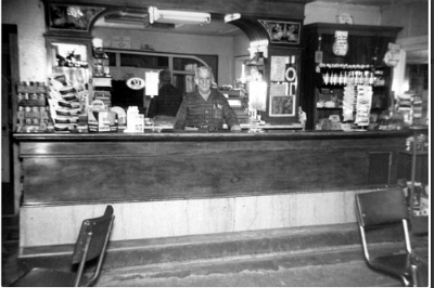 19xx Oatman - Mission Inn with Doc Hines behind the bar