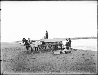 Small outboard before being launched at Needles in the Colorado River, ca.1900 Photograph of a small outboard boat named Edith before being launched in the Colorado River at Needles ca.1900. The boat is owned by George Wharton James. It...